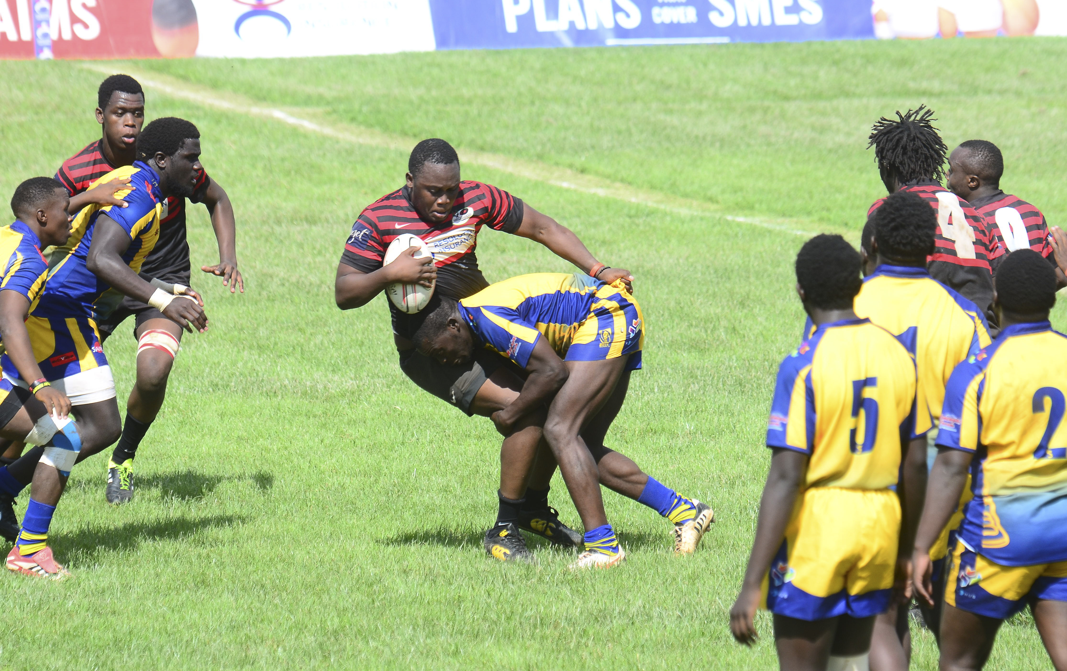 Impala prop Joshua Momanyi is tackled by Homeboyz II flanker Keith Wasike