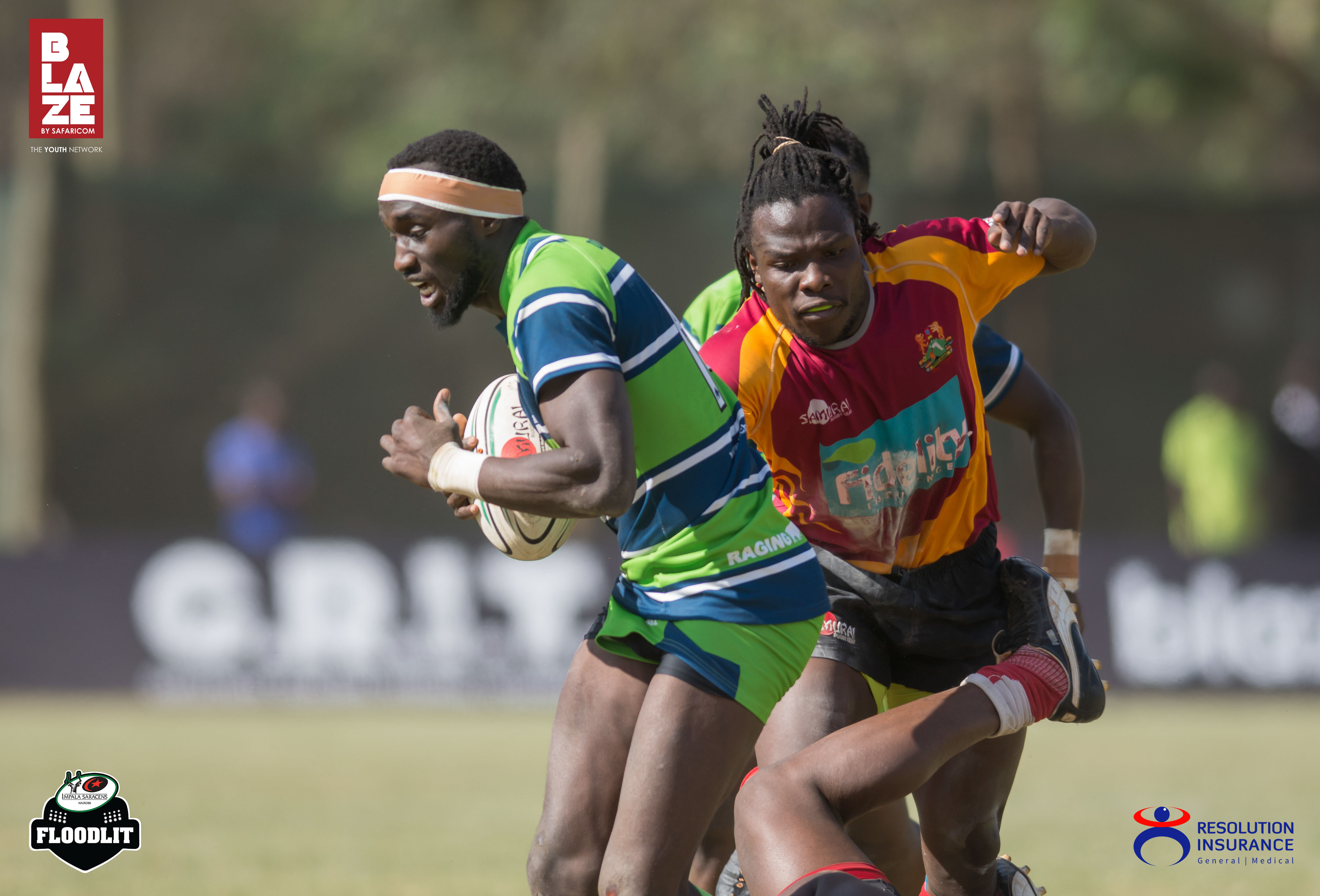 Tony onyango of KCB brushing off a tackle from Archadius Khwesa of Blakblad.